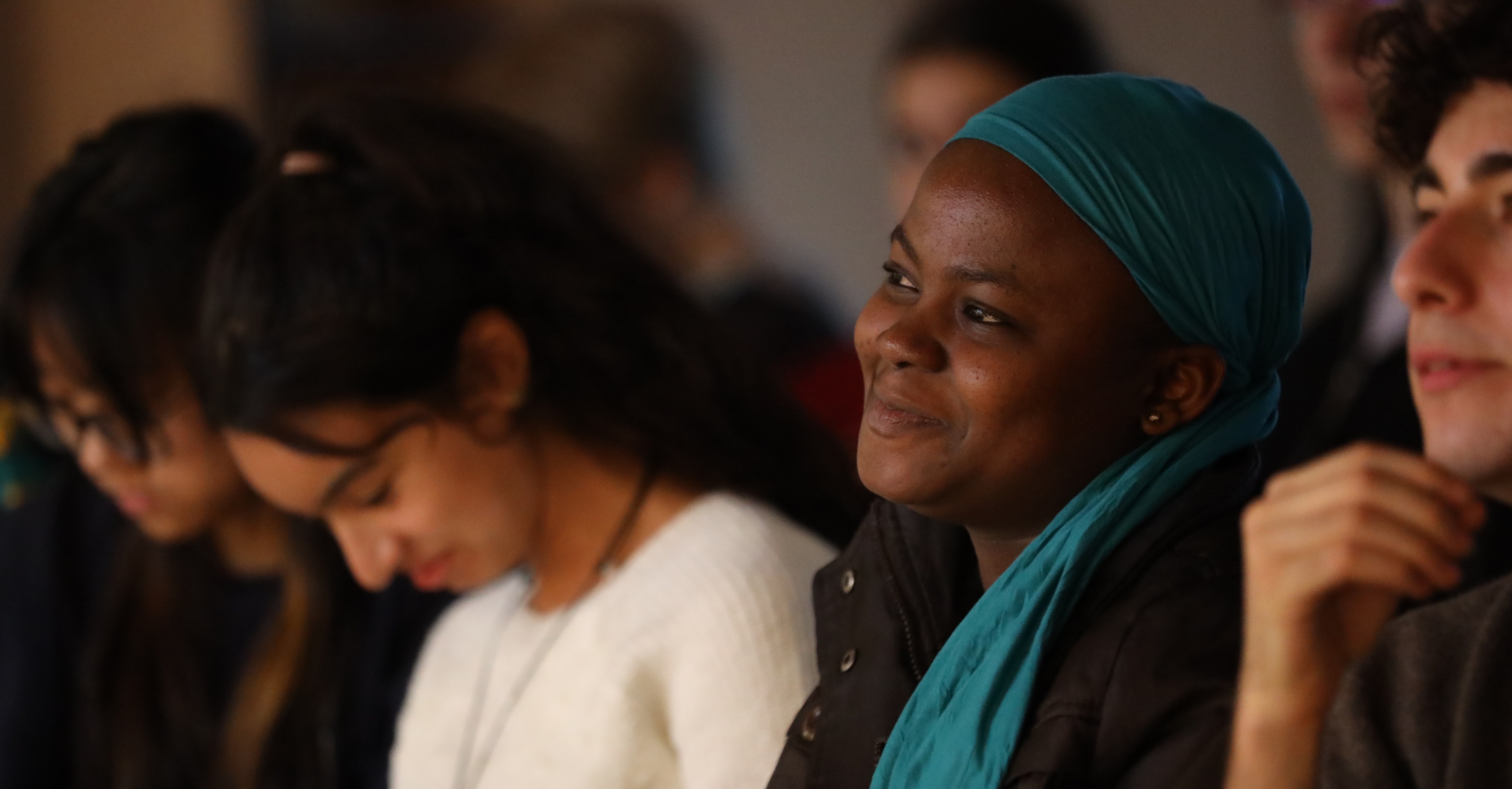  Esperance, a UWCAD student from Togo, listening to the presentations. (Photo: Erika Burolo)