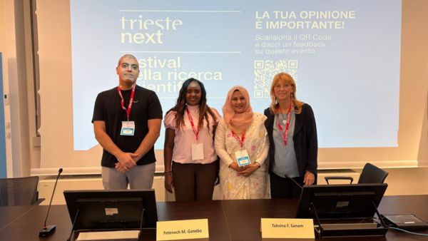 The three panellists at TWAS Trieste Next roundtable. From left: Ahmed Hassoon, professor of epidemiology and AI at the Johns Hopkins Bloomberg School of Public Health, of Baltimore, US; Fetenech Meskele Ganebo, professor of computer science at Wolaita Sodo University, Ethiopia; Tahsina Farah Sanam, professor of technology management at the Bangladesh University of Engineering and Technology (BUET), Bangladesh; and Cristina Serra, TWAS Staff Writer and roundtable chairperson. (Photo: F. Blasetti/ICTP) 