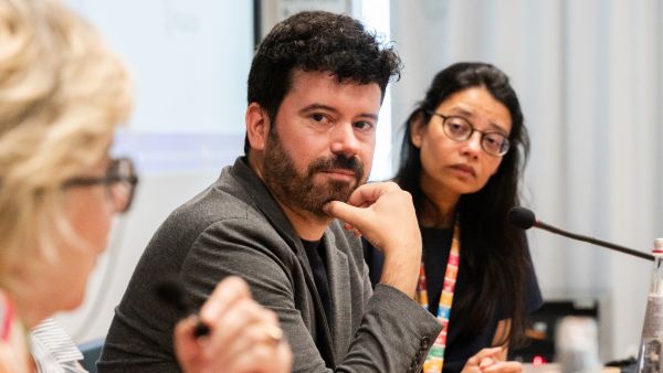 Alexis Roig, CEO, SciTech DiploHub, Barcelona's Chief Science and Tech Envoy SciTech DiploHub, Spain; and Payal Patel (background), TWAS Associate Programme Officer. (Photo: G. Ortolani/TWAS)