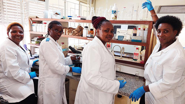 Esther Gathoni Kanduma of Kenya (far left), with colleagues in her lab.